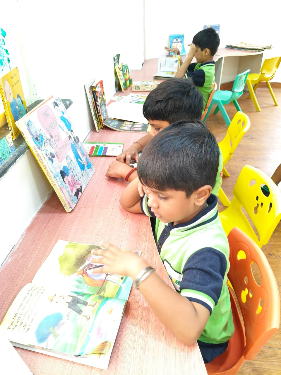 Teacher guiding children in early learning